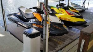 Two PWCs on a dual jet ski docking platform at Lake of the Ozarks